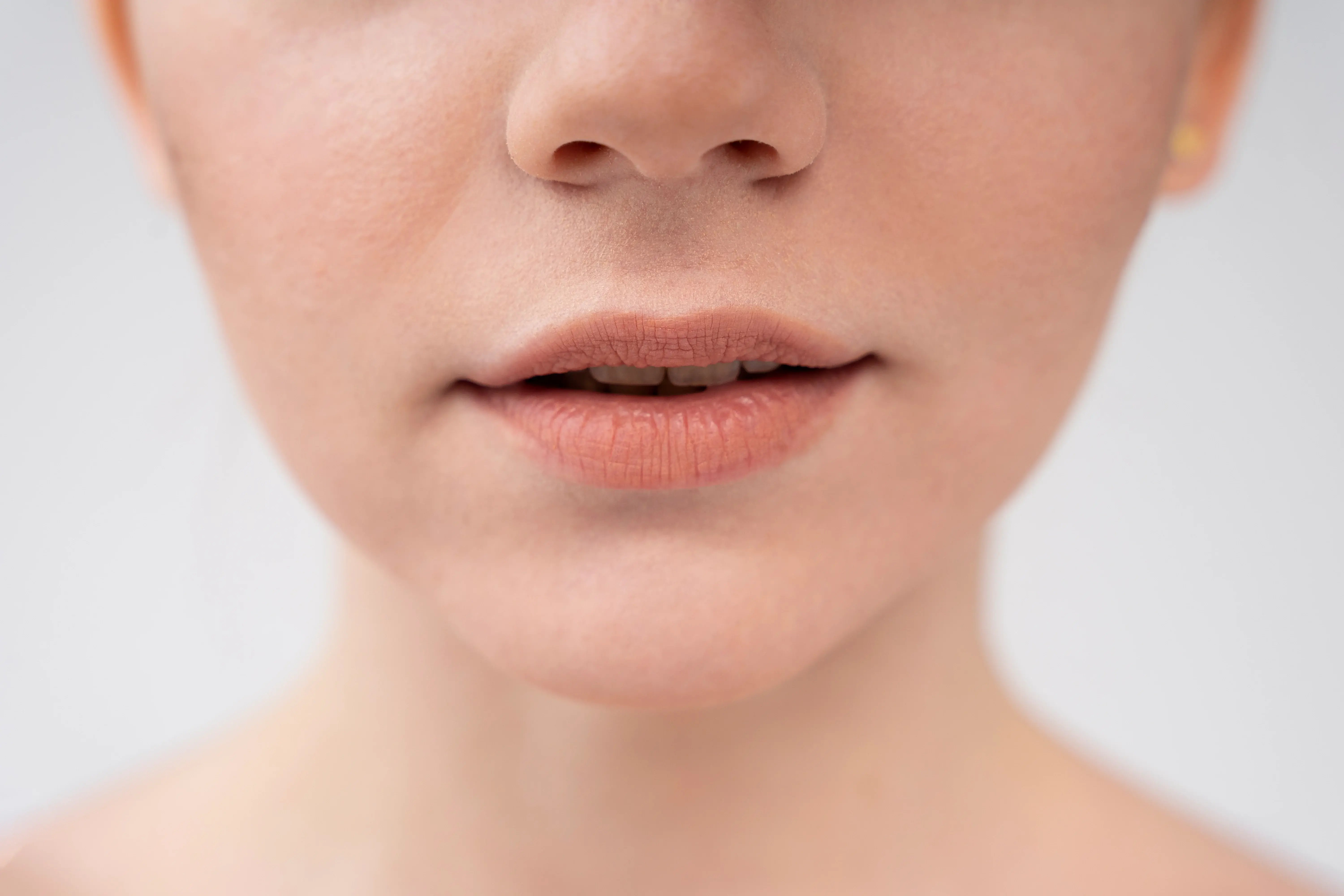 Close up of women with upper lip pigmentation